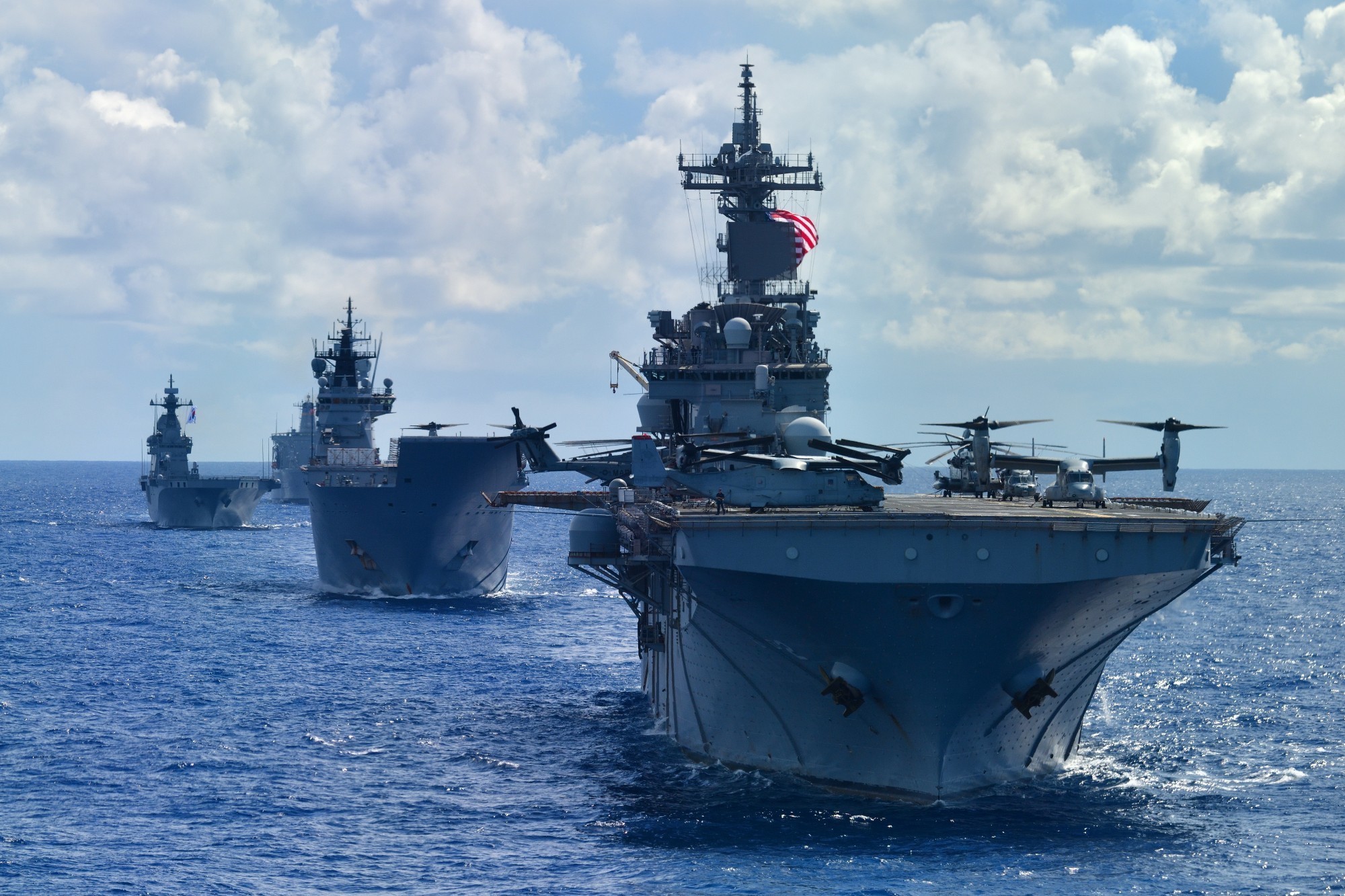 This is an image of military vessels transiting the ocean as part of the Rim of the Pacific event.